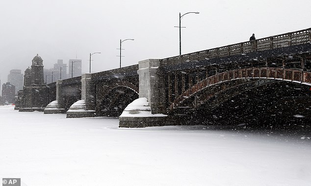 Frozen Charles River's Shifting Ice Sparks Safety Warnings in Boston