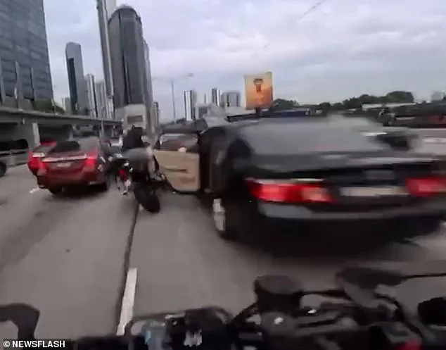Tragic Incident on Kuala Lumpur Motorway: Two-Year-Old's Door Opening Injures Two Motorcyclists