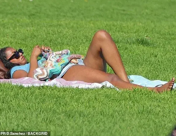 Sasha Obama Knits and Relaxes at Everett Park