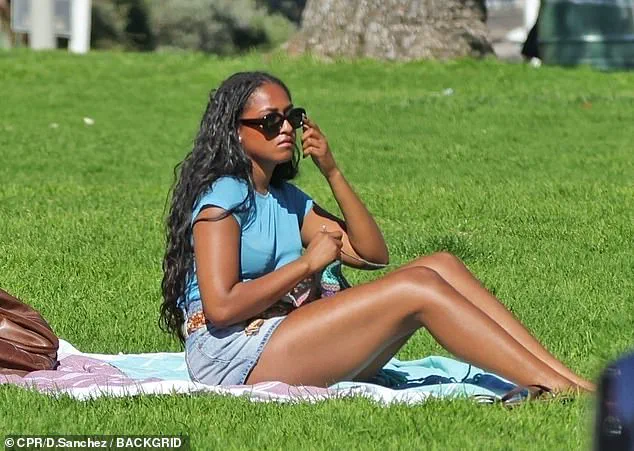 Sasha Obama Knits and Relaxes at Everett Park
