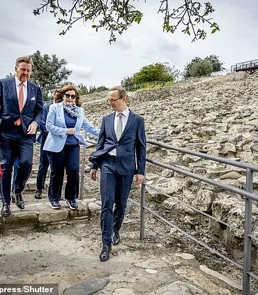 Queen Maxima of the Netherlands Visits Cyprus in Burgundy Elegance