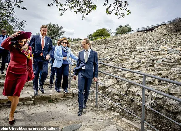 Queen Maxima of the Netherlands Visits Cyprus in Burgundy Elegance