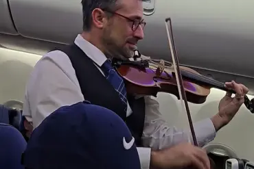 United Airlines Crew Member's Violin Performance Divides Online Audience