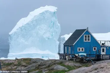 Exclusive Images Reveal Perilous Iceberg Movement Near Greenland Shoreline, Prompting Urgent Warnings