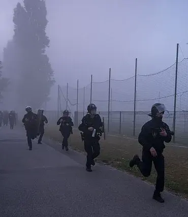 Violent Clashes Erupt in Northern France as Riot Police Confront Migrants Over Boat Interception Efforts