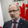 Attack on Former Polish Health Minister Amid Pandemic Tensions Sparks Debate on Public Dissent and Official Safety